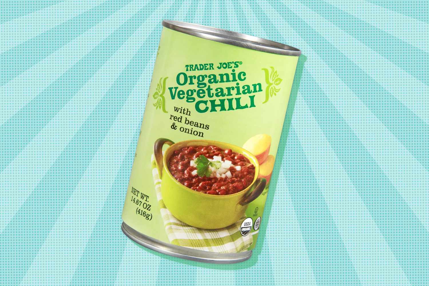 A can of Trader Joe's organic vegetarian chili on a blue illustrated background