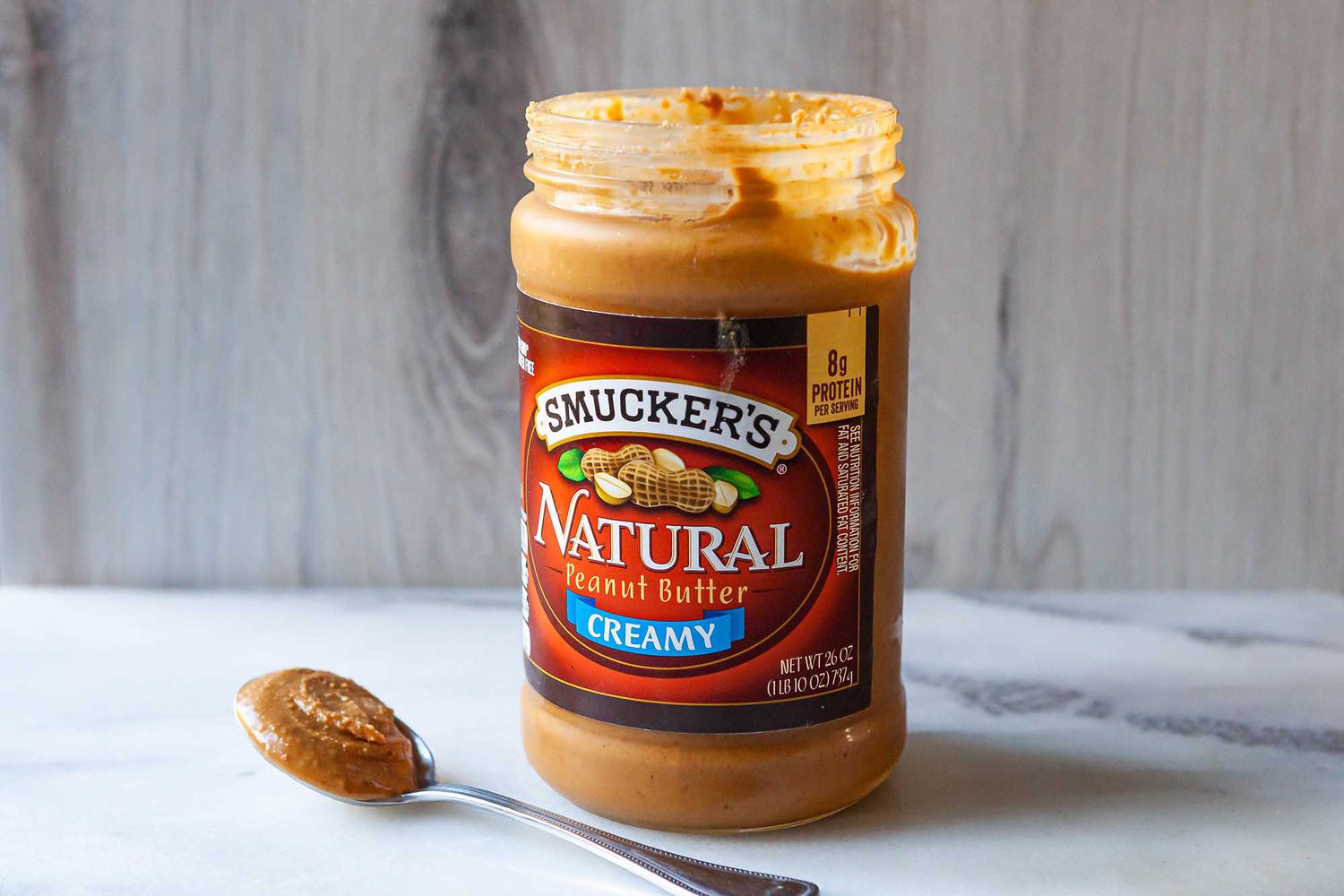 Jar of creamy peanut butter