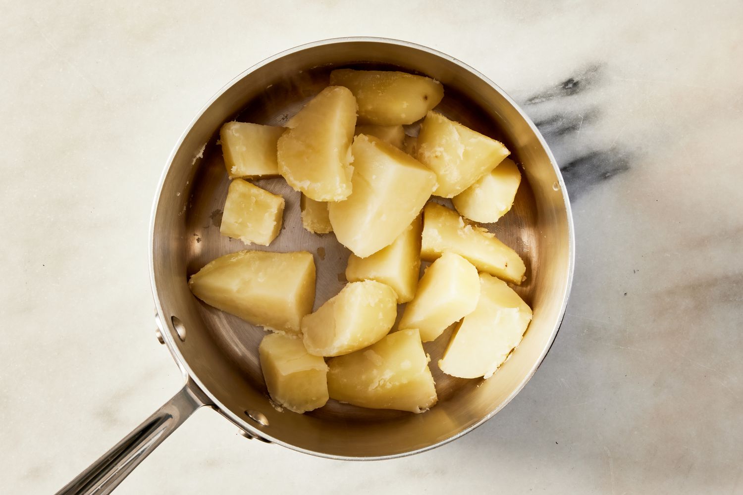 cooked potatoes in a pot for Korean-style potato salad recipe