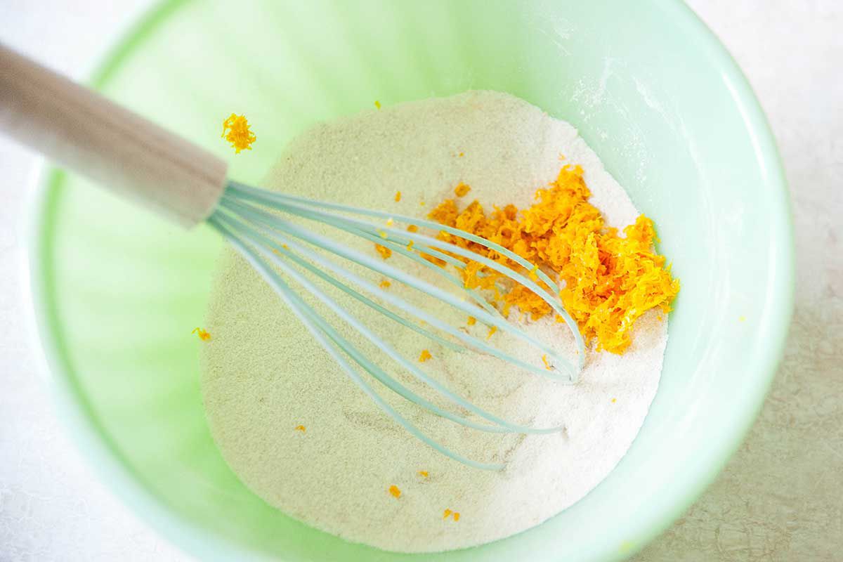 Best Ever Rhubarb Custard Pie - orange zest and custard in bowl