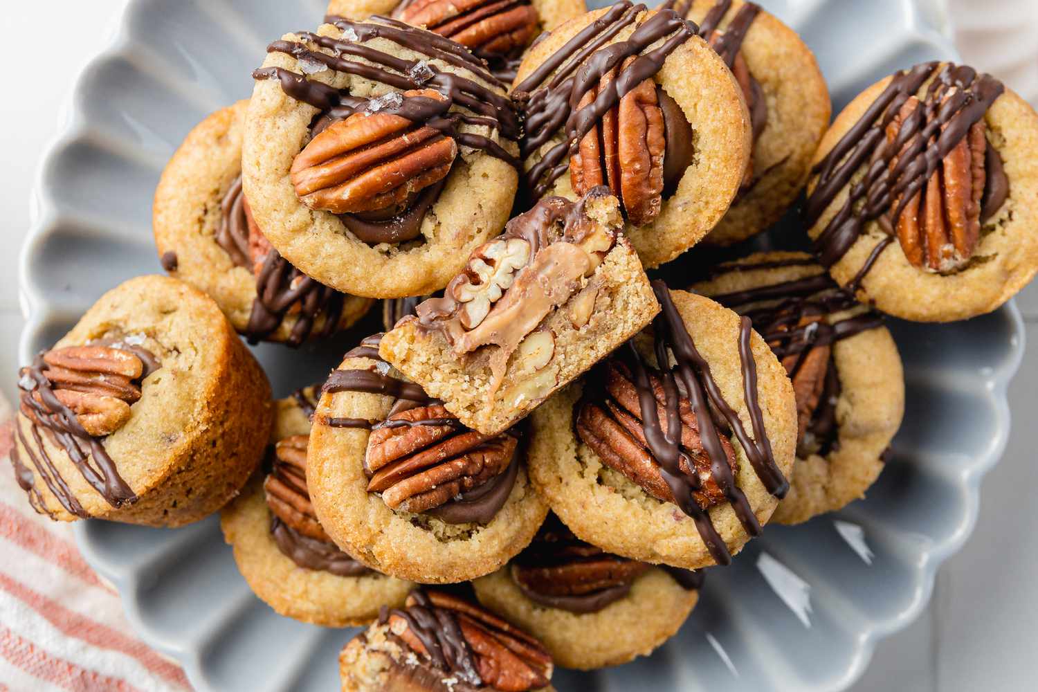 Plate with Turtle Cookie Cups with the Top Cookie Cup Cut in Half