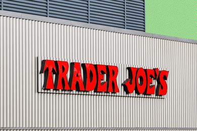 Trader Joes store sign on a building wall