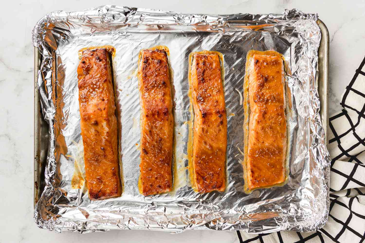 Cooked Miso Glazed Salmon on Aluminum Lined Baking Sheet 