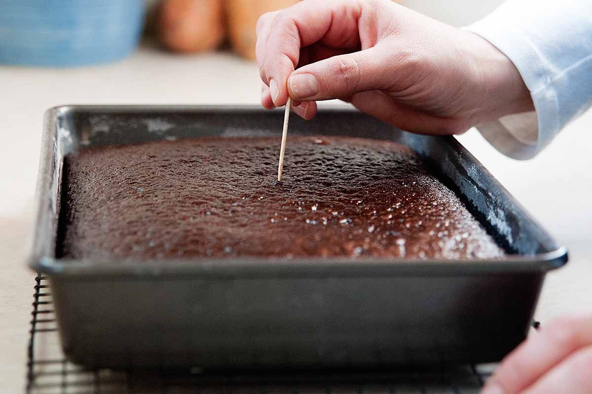 Chocolate Cake with Sour Cream Added - testing the cake for doneness