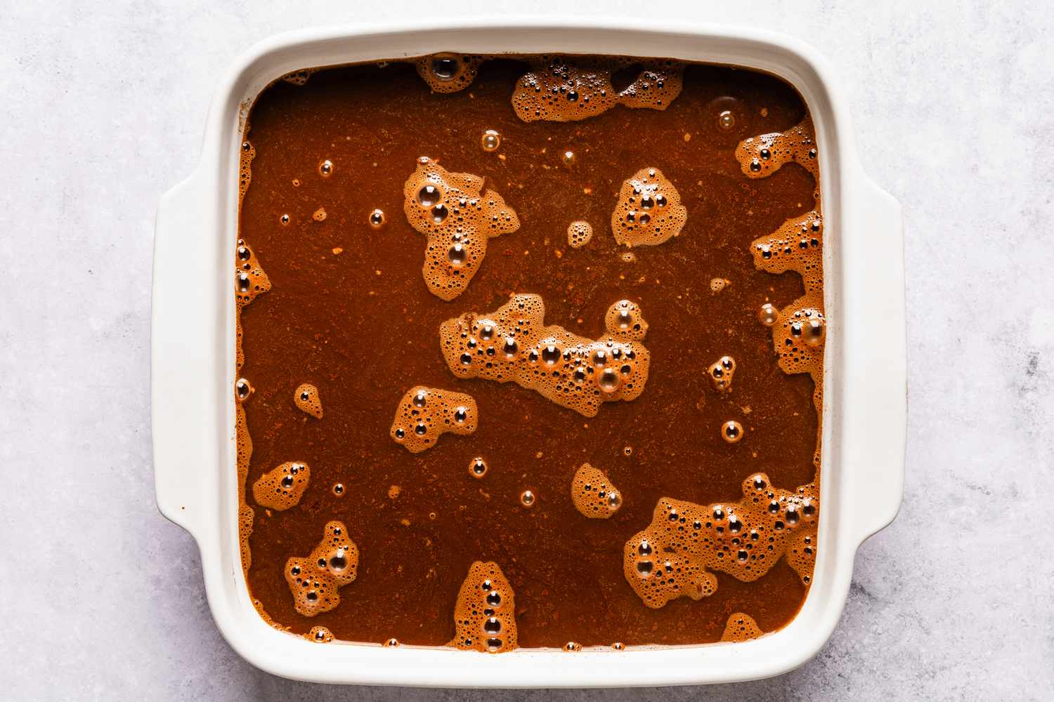 second layer added to baking pan for chocolate pudding cake recipe