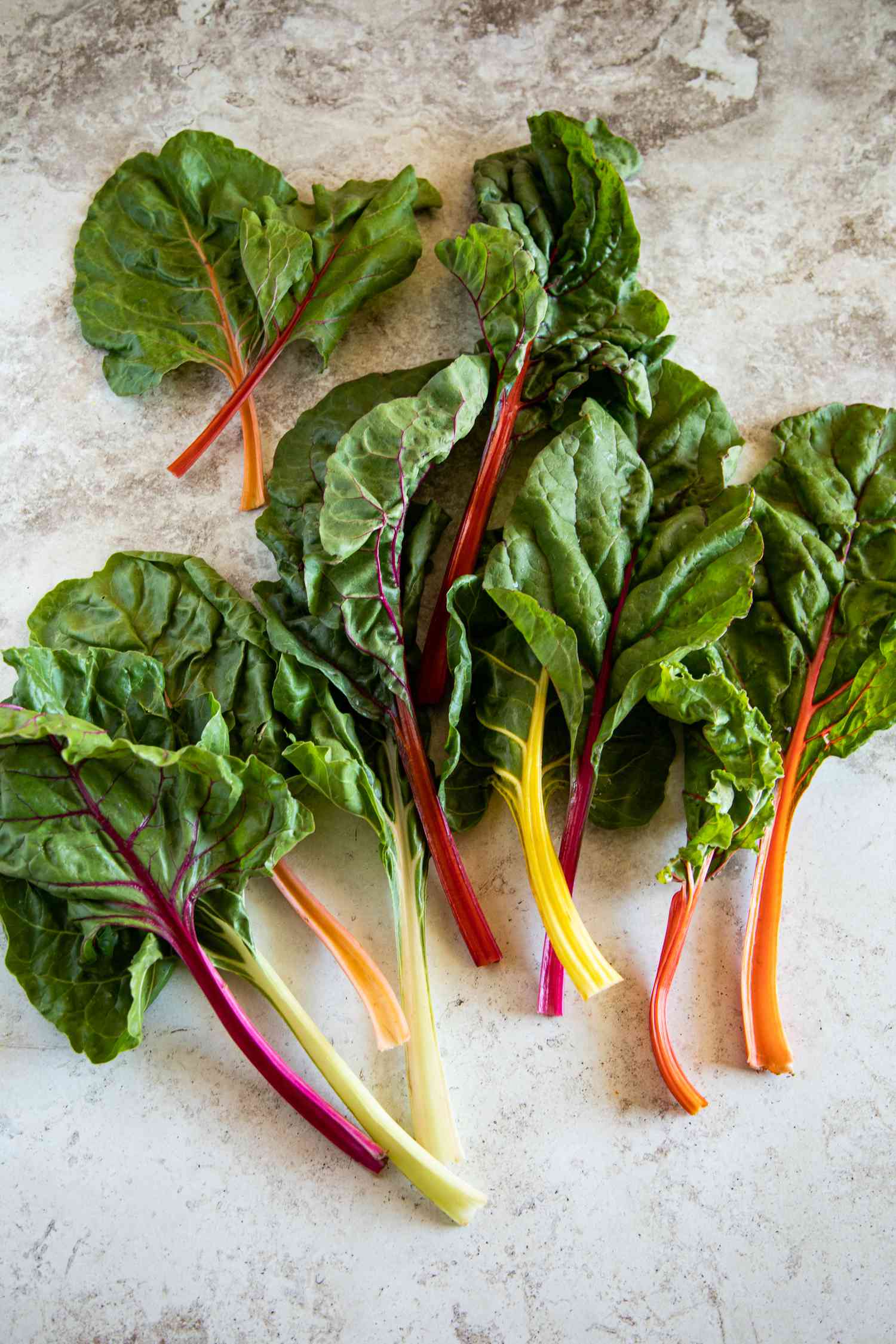 Rainbow chard on a marble surface