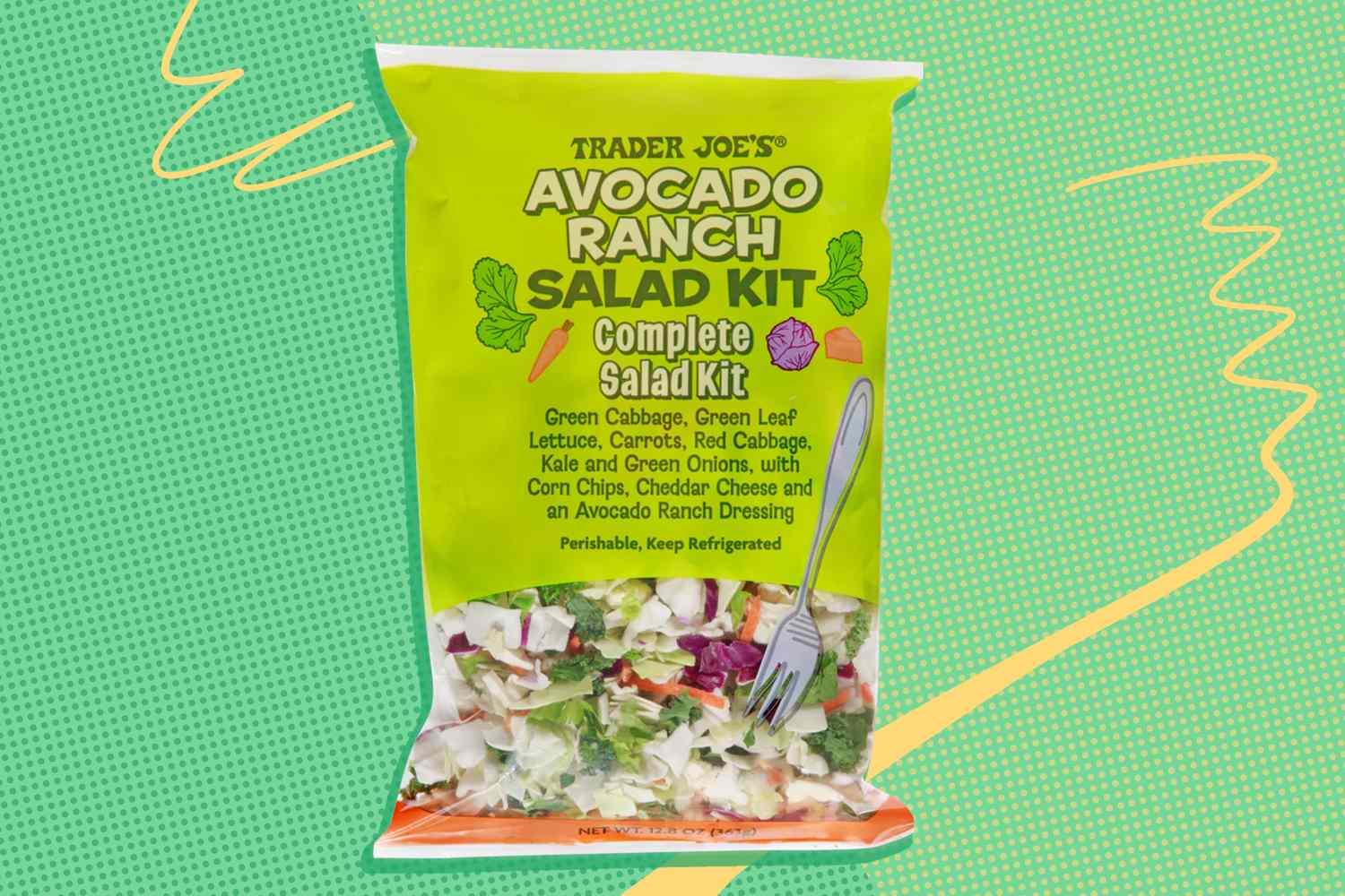 Trader Joes Avocado Ranch Salad Kit package on a designed background featuring ingredients such as green cabbage and kale