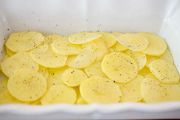 sliced potatoes for chicken thighs with potatoes