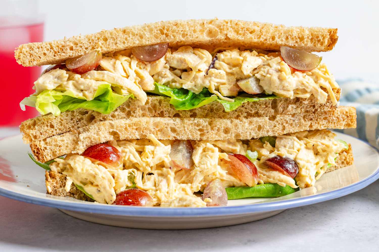 Chicken Salad with Grapes sandwich cut in half