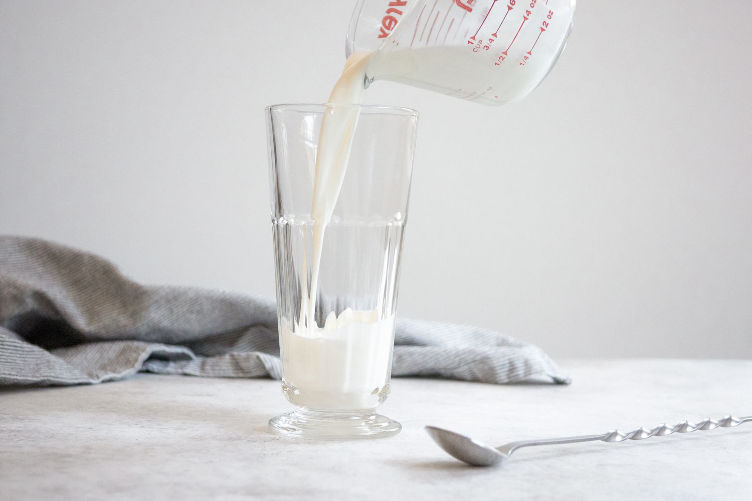 Pour Milk in Glass for Egg Cream
