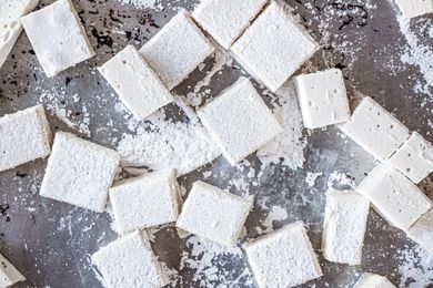 Vegan marshmallows on a tray and covered in cornstarch