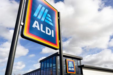 A large ALDI sign outside of a ALDI store