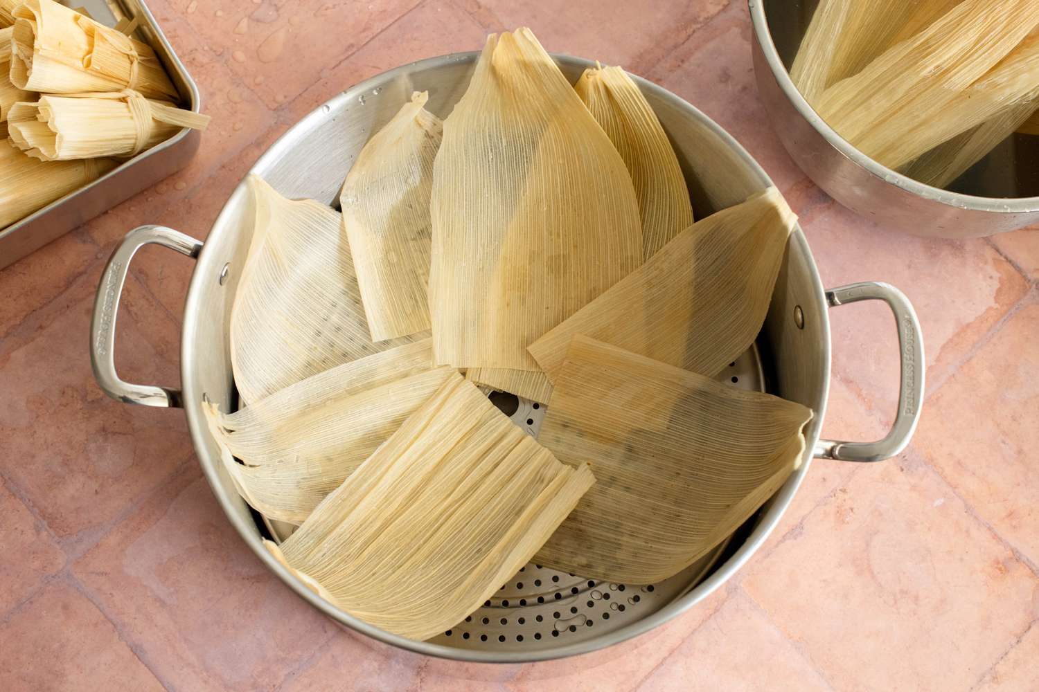 In the Pot, a Large Steamer Lined with Corn Husks
