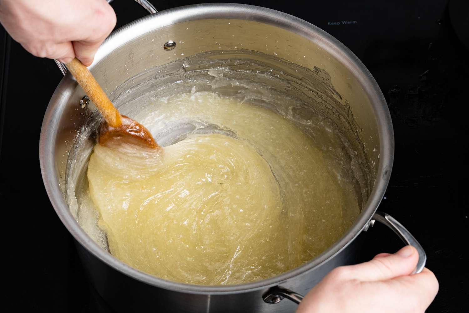 Wooden Spoon Used to Slowly Mix the Condensing Sugar-Cornstarch Mixture for Turkish Delight Recipe