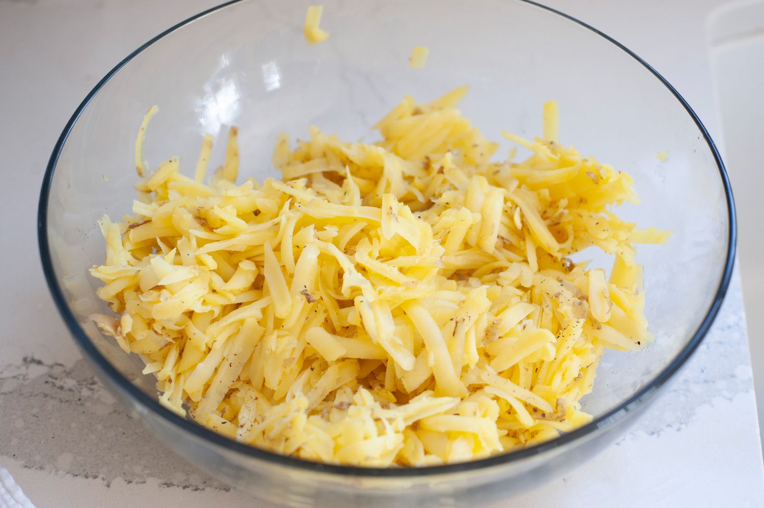 Grated Potatoes in a Bowl for Rosti