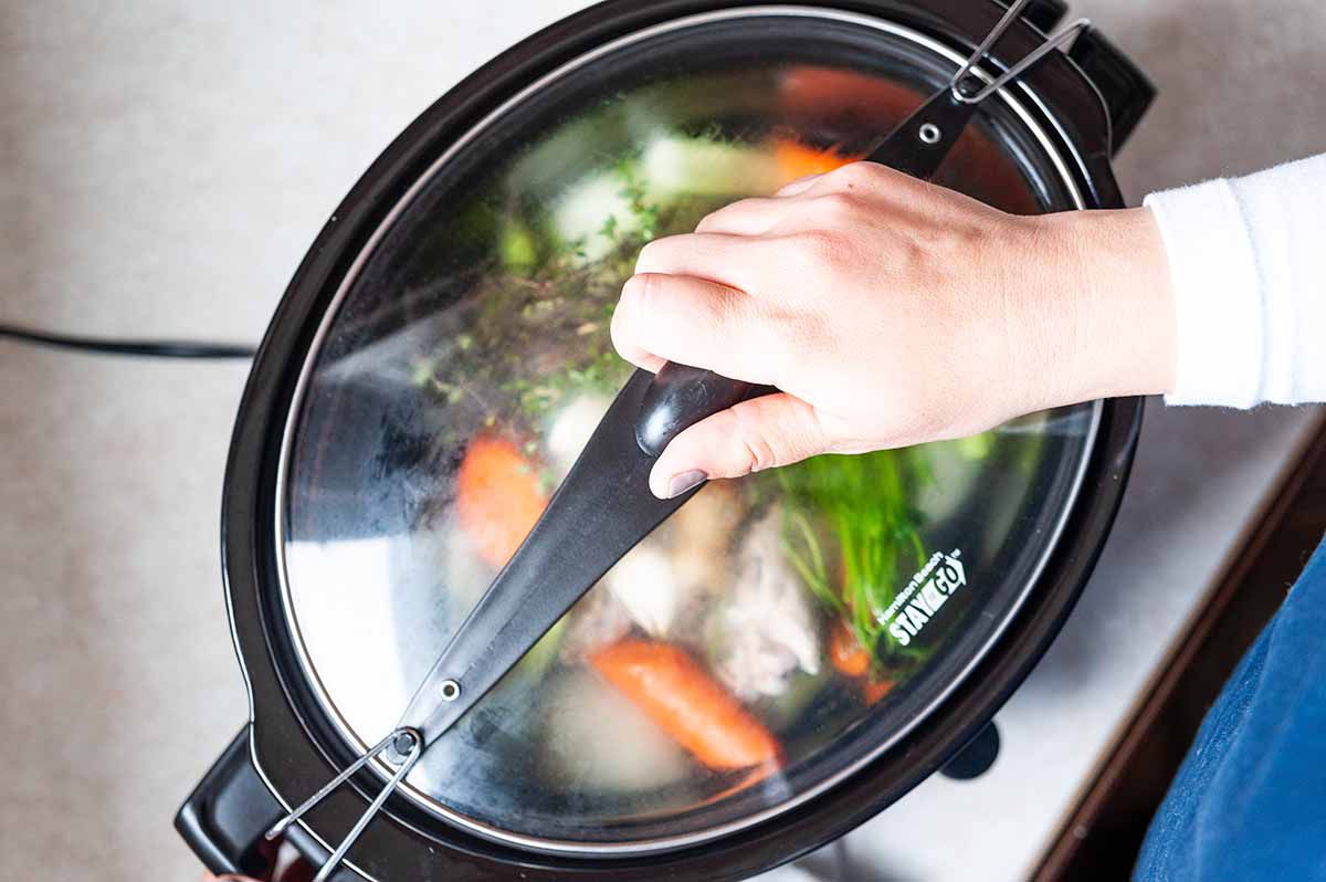 Homemade Chicken Stock put a lid on it