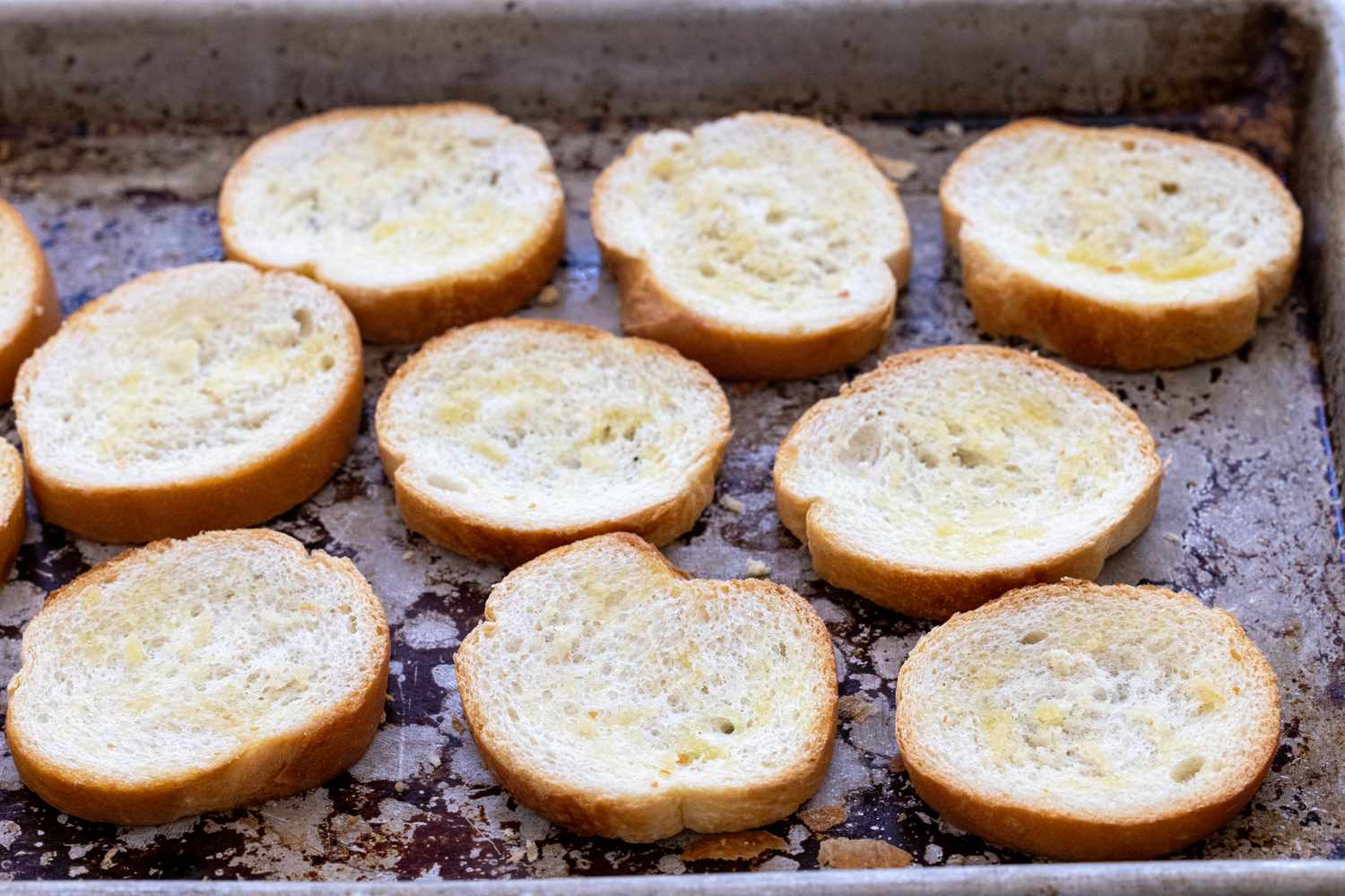 Toasted crostinis for smoked salmon, cucumber, and cream cheese crostini.