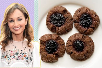 Giada De Laurentiis next to a plate of cookies with a jam center