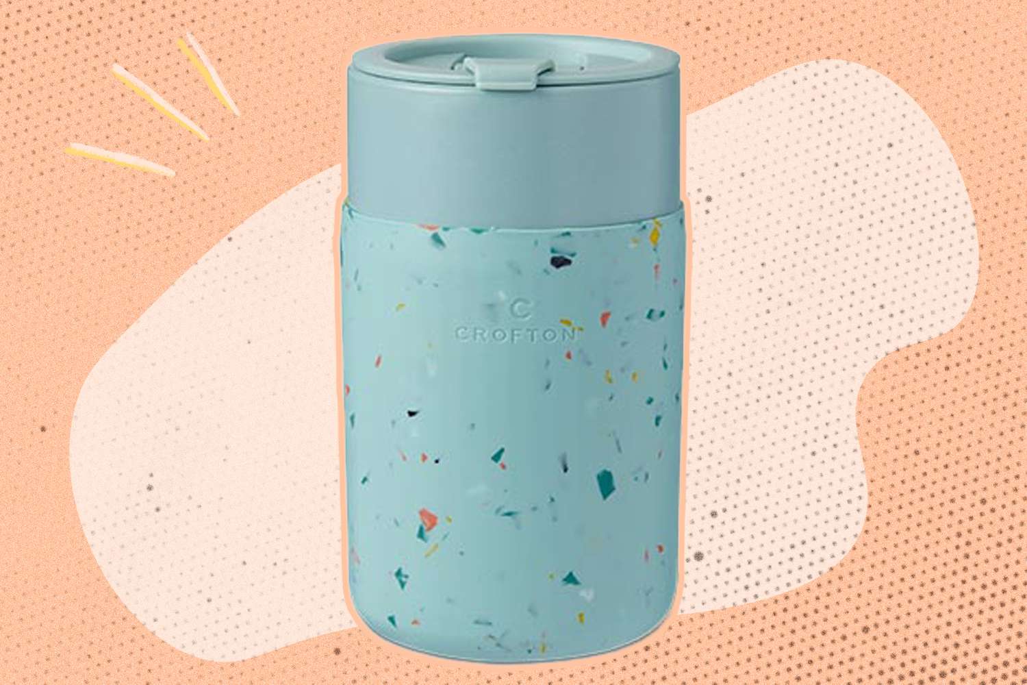 ALDI's Ceramic and Silicone Travel Mug on an illustrated background