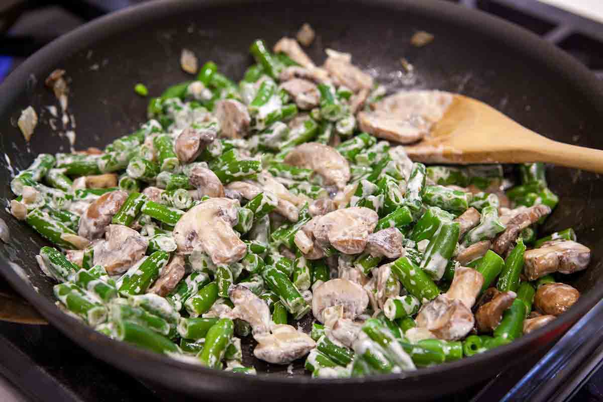 sour cream added to green beans and mushrooms