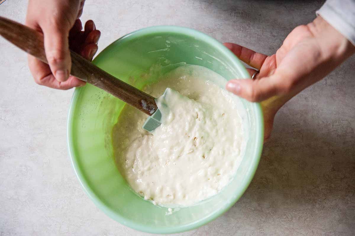 Mixing pancake batter in green bowl
