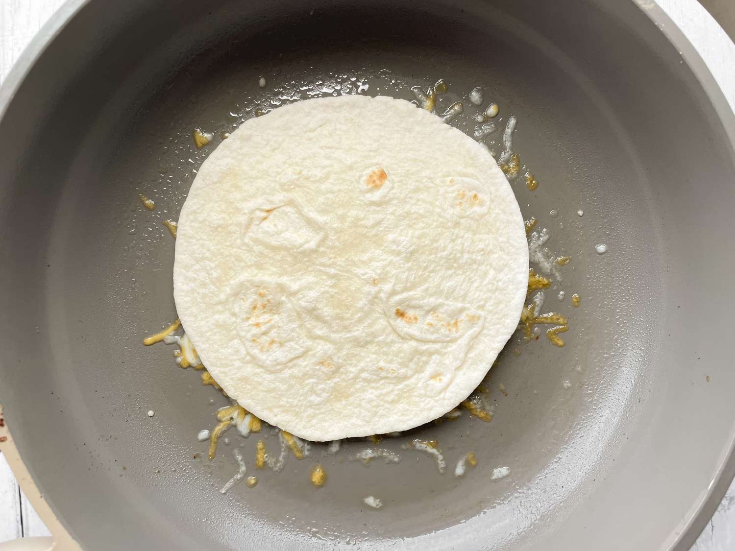Tortilla on Top of Cheese for Burnt Cheese Taco Recipe