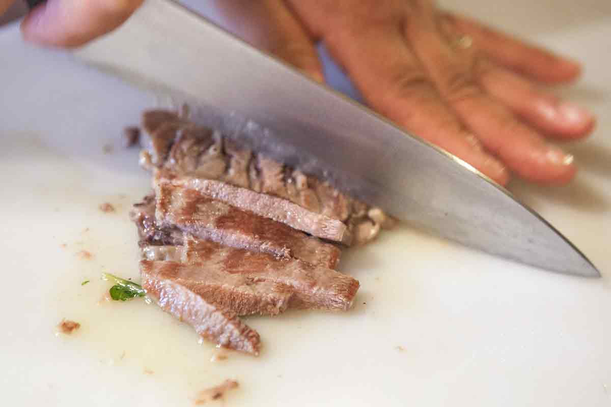 slice cooked beef tongue for tongue tacos