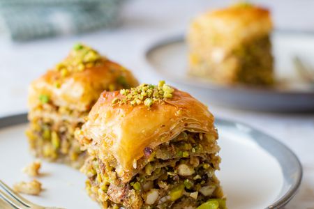 Slices of Baklava on a Small Plate with a Fork