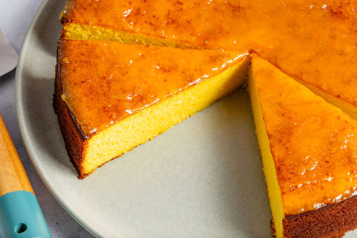 Whole Orange Cake, close up, 2 slices cut out