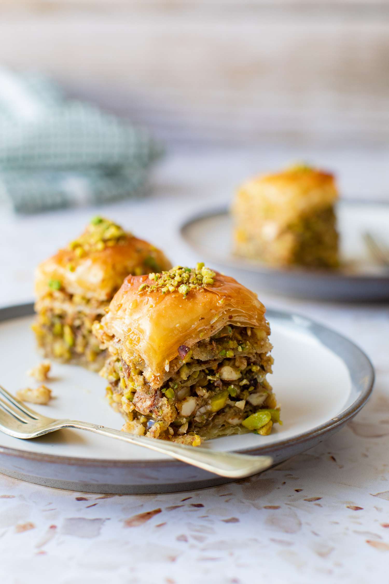 Slices of Baklava on a Small Plate with a Fork