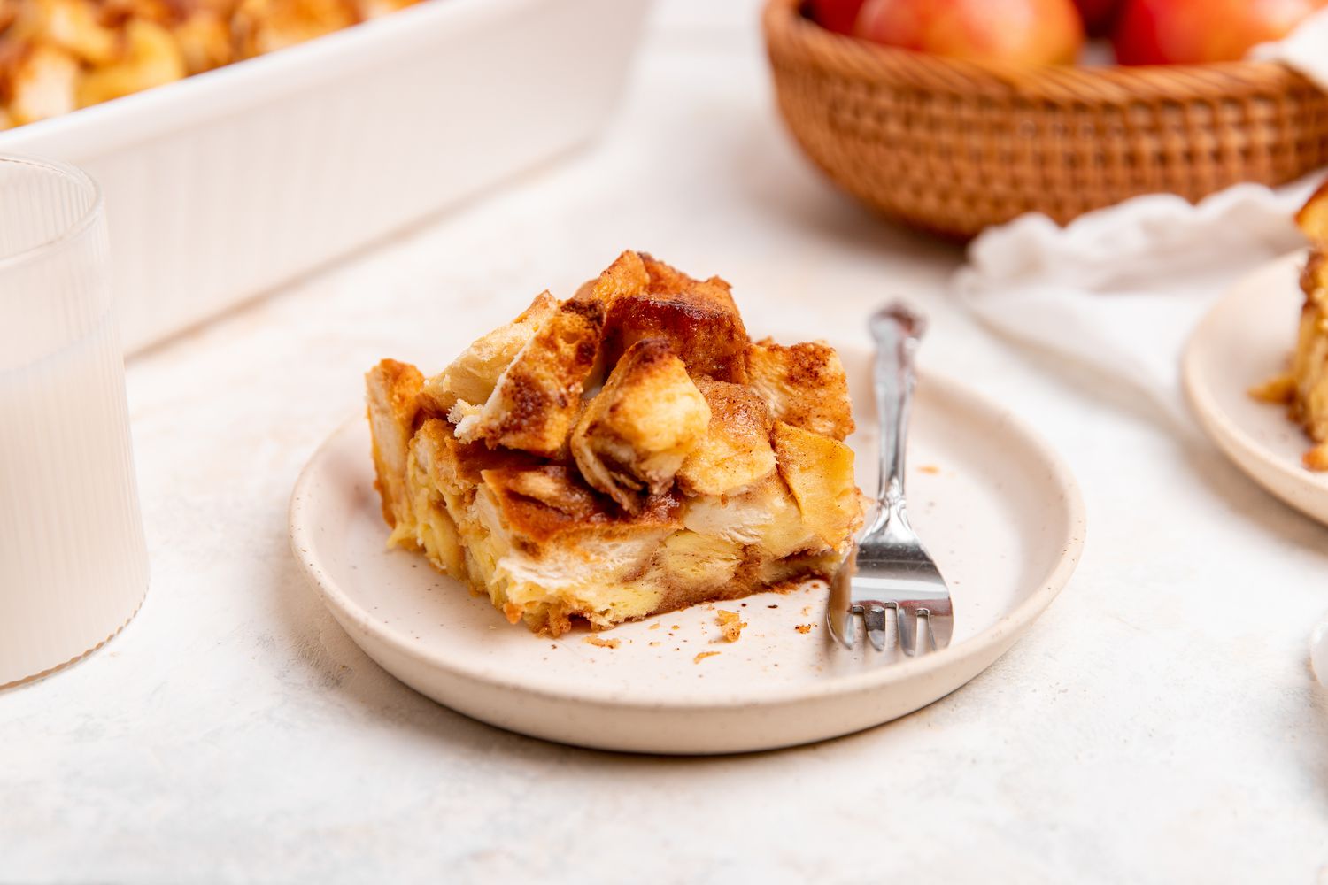 Slice of Apple Bread Pudding on a Plate