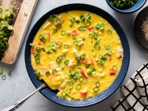 Korean steamed eggs in blue bowl.