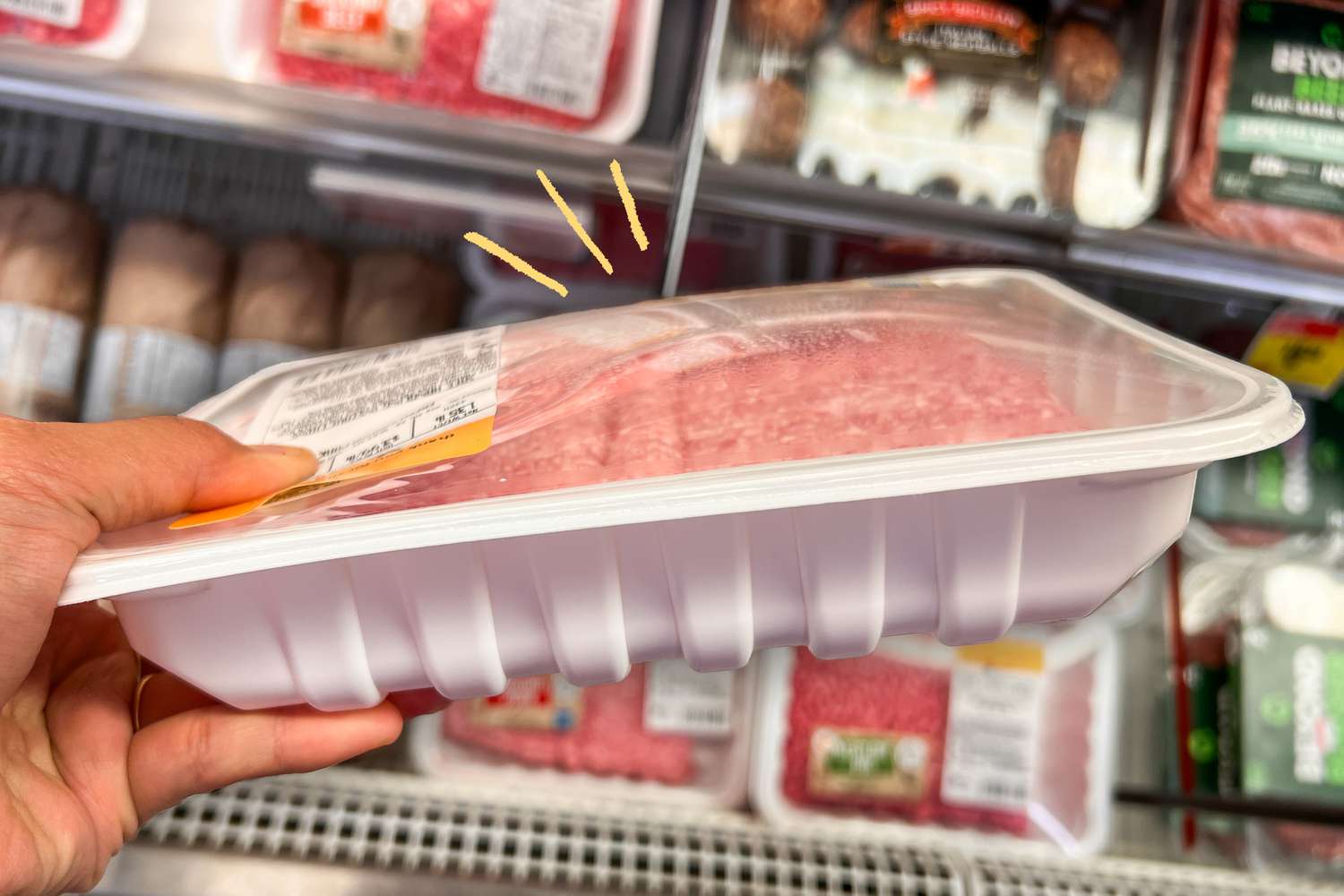 Puffed up container of meat