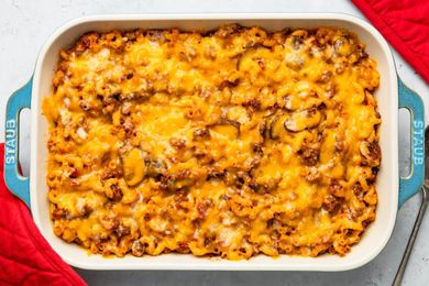 Baked pasta casserole topped with melted cheese in a rectangular dish