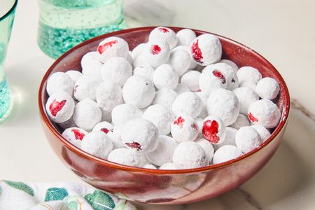Bowl of sugared cranberries on a table