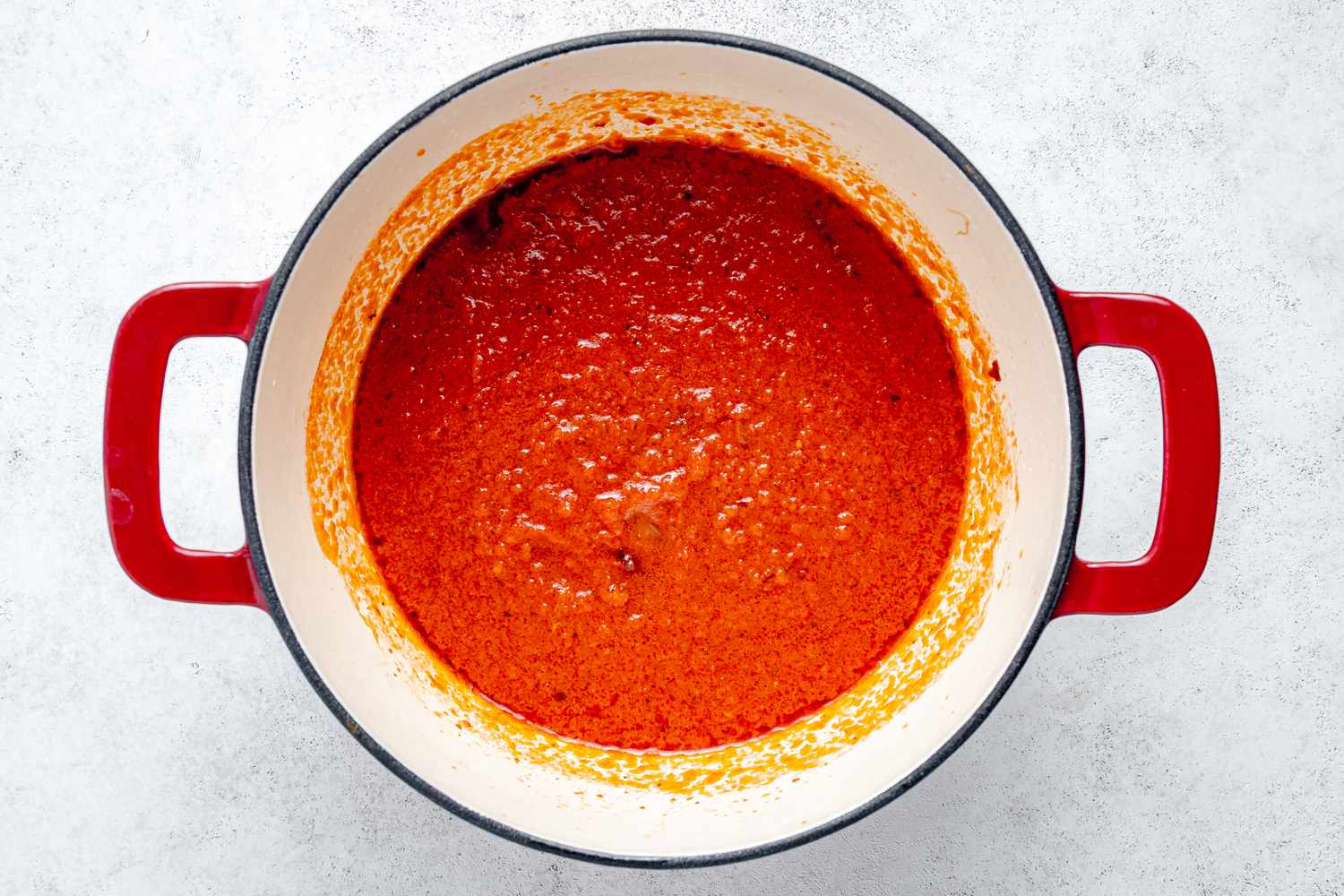 Pureed Pepper Stew Based Added to Dutch Oven for West African Rice Recipe