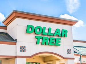 Entrance of a Dollar Tree store with its name displayed on the building