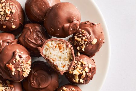 close up of Martha Washington Candy, one cut open, on a plate
