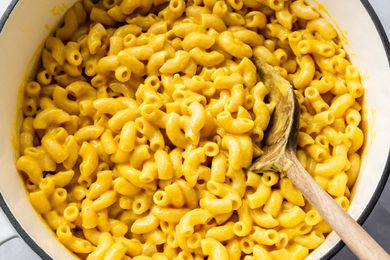 Pot of Vegan Mac and Cheese with a Wooden Spoon