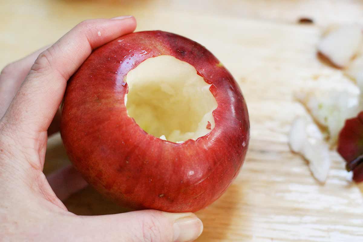 Looking into a hollowed out apple ready to be stuffed