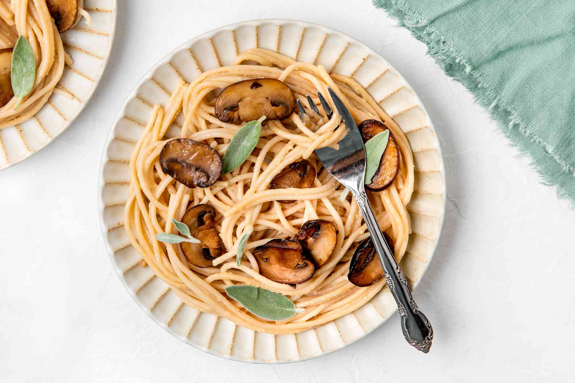 Creamy Miso Mushroom Pasta on a Plate with a Fork