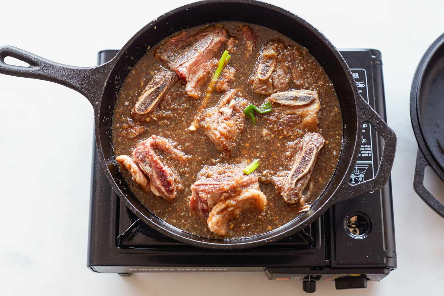 Braising liquid and ribs to make shortcut Korean braised short ribs 