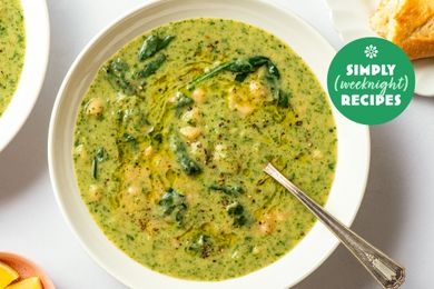 A bowl of soup with greens and chickpeas Simply Recipes logo in the corner