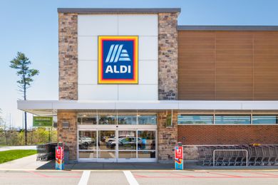 Front entrance door and sign of an Aldi Supermarket 