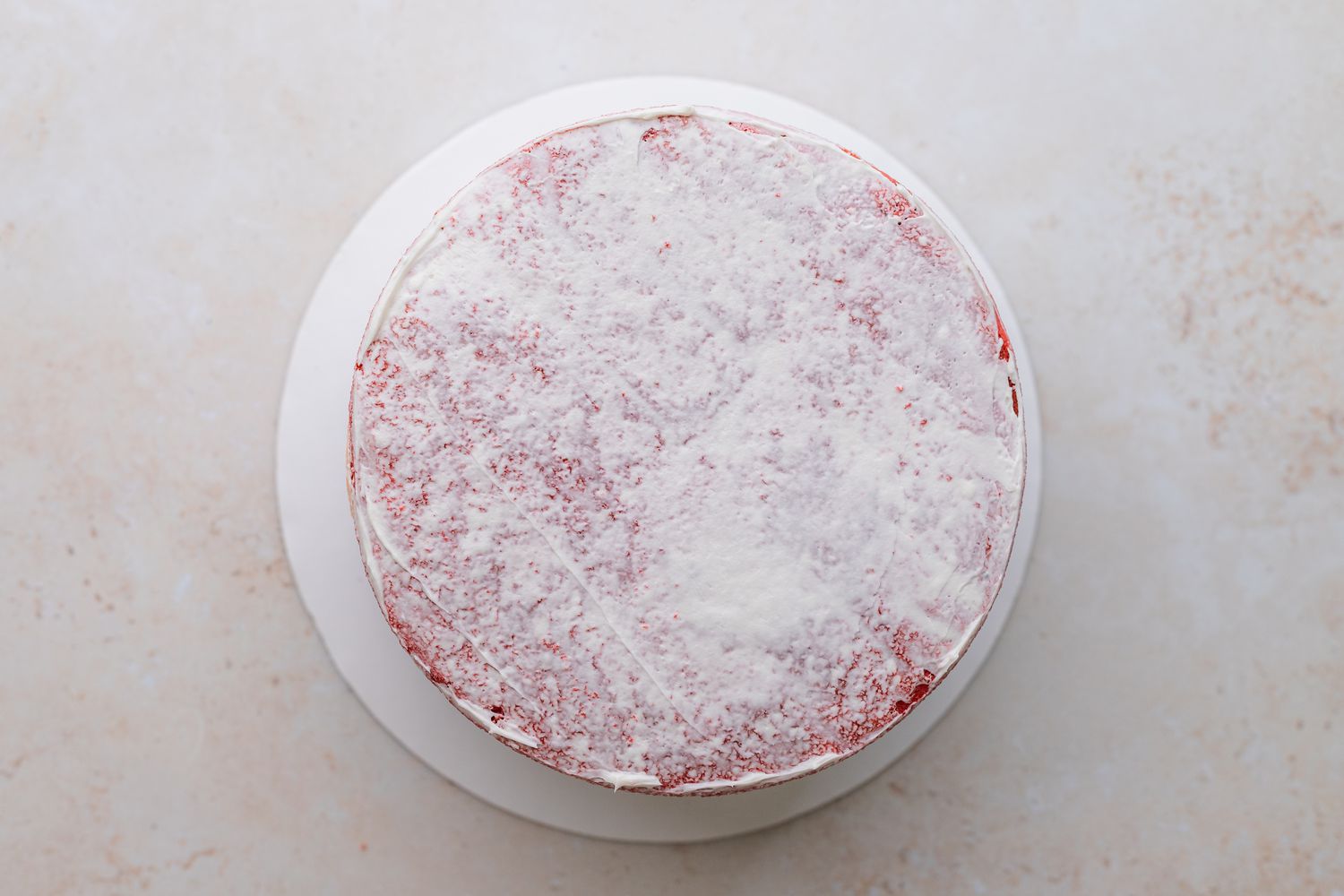 Crumb Coat of Rainbow Layer Cake