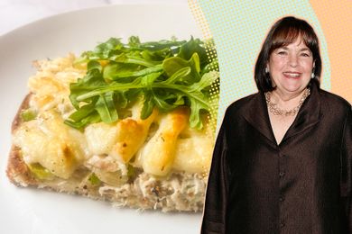 Ina Garten beside a tuna melt sandwich with arugula topping