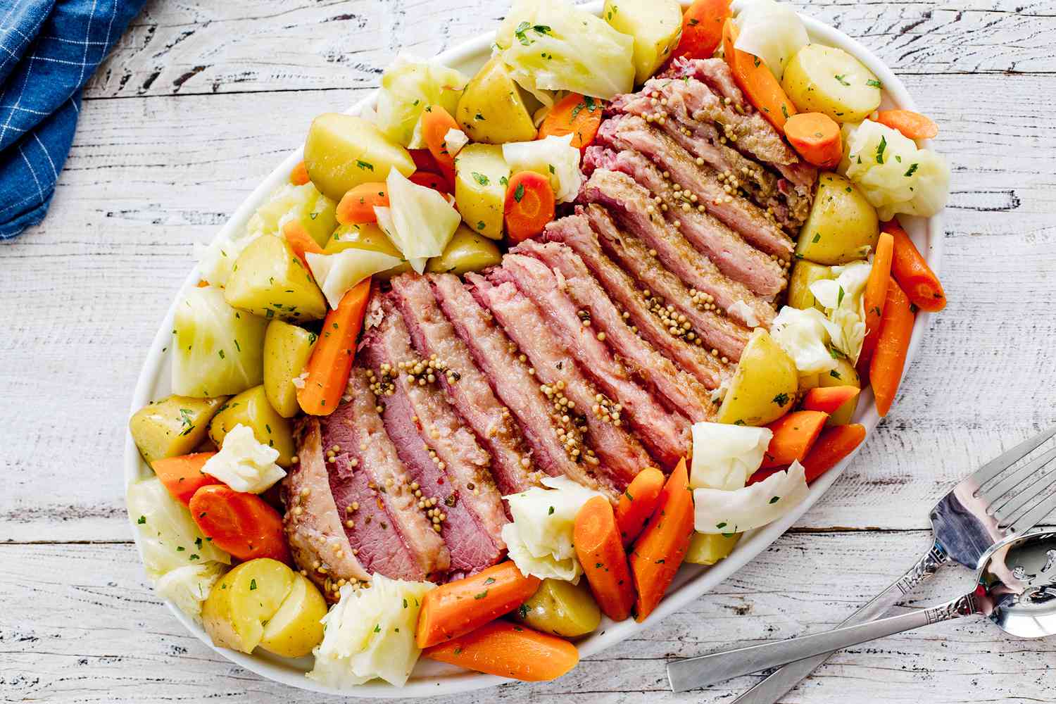 Instant Pot corned beef and cabbage sliced on a platter