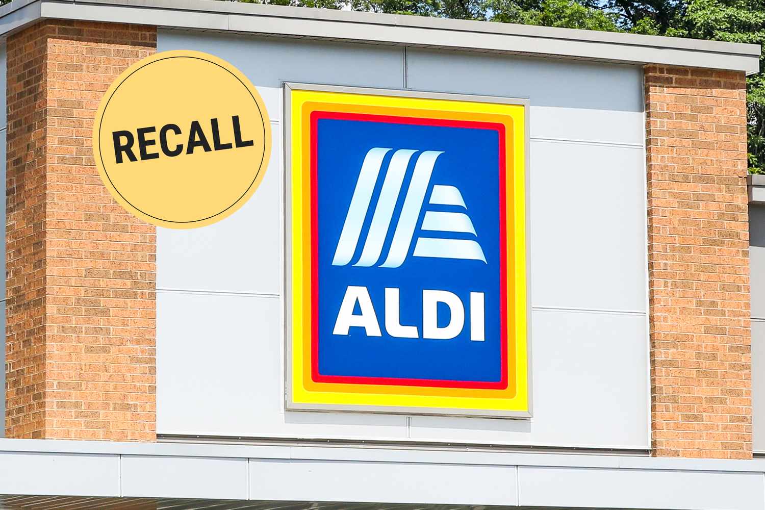 Aldi storefront with a recall symbol displayed