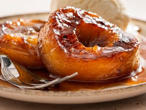 close up of Melting Apples on a small dessert plate with a fork