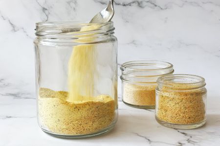 Homemade adobo seasoning in clear jar